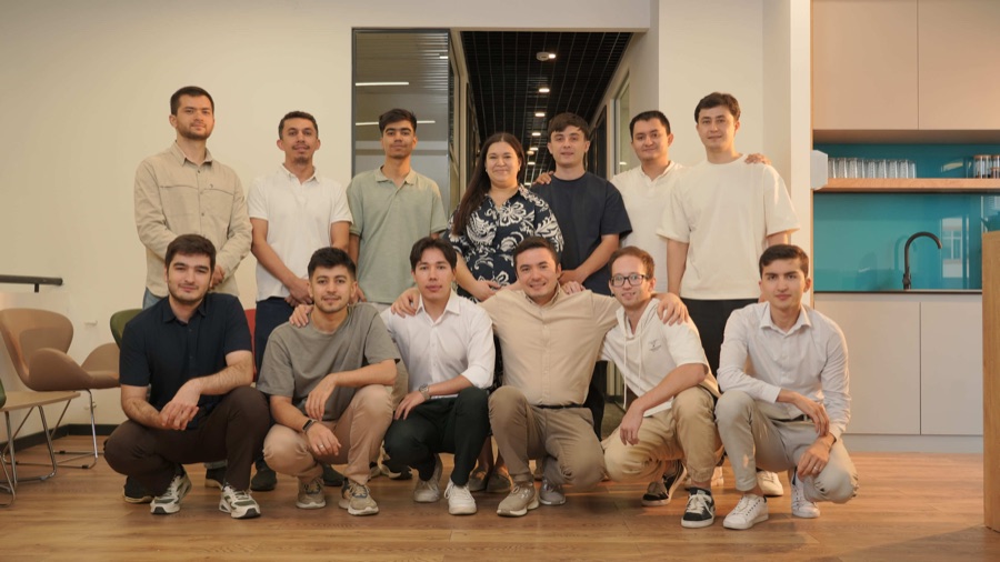 The wider Ayan team together in the office