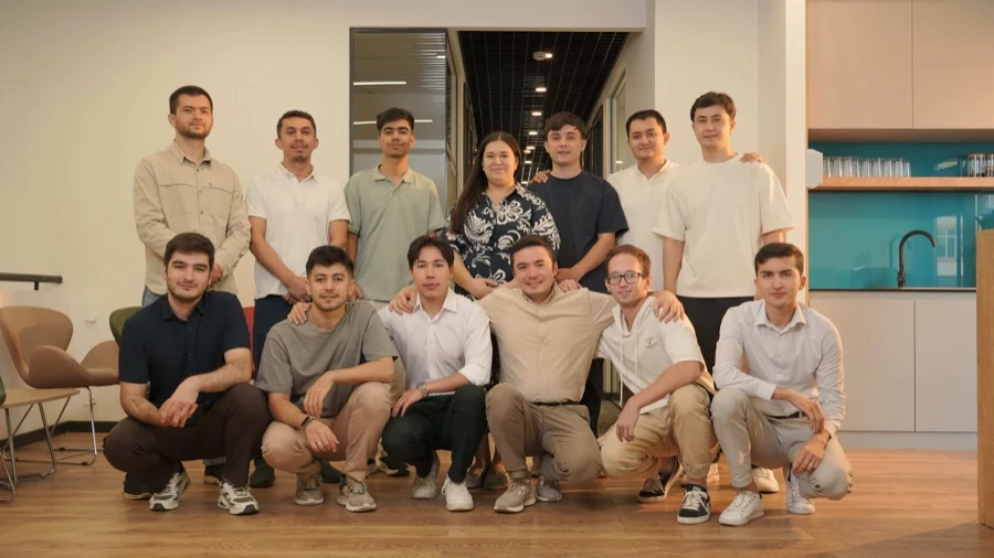 The wider Ayan team together in the office